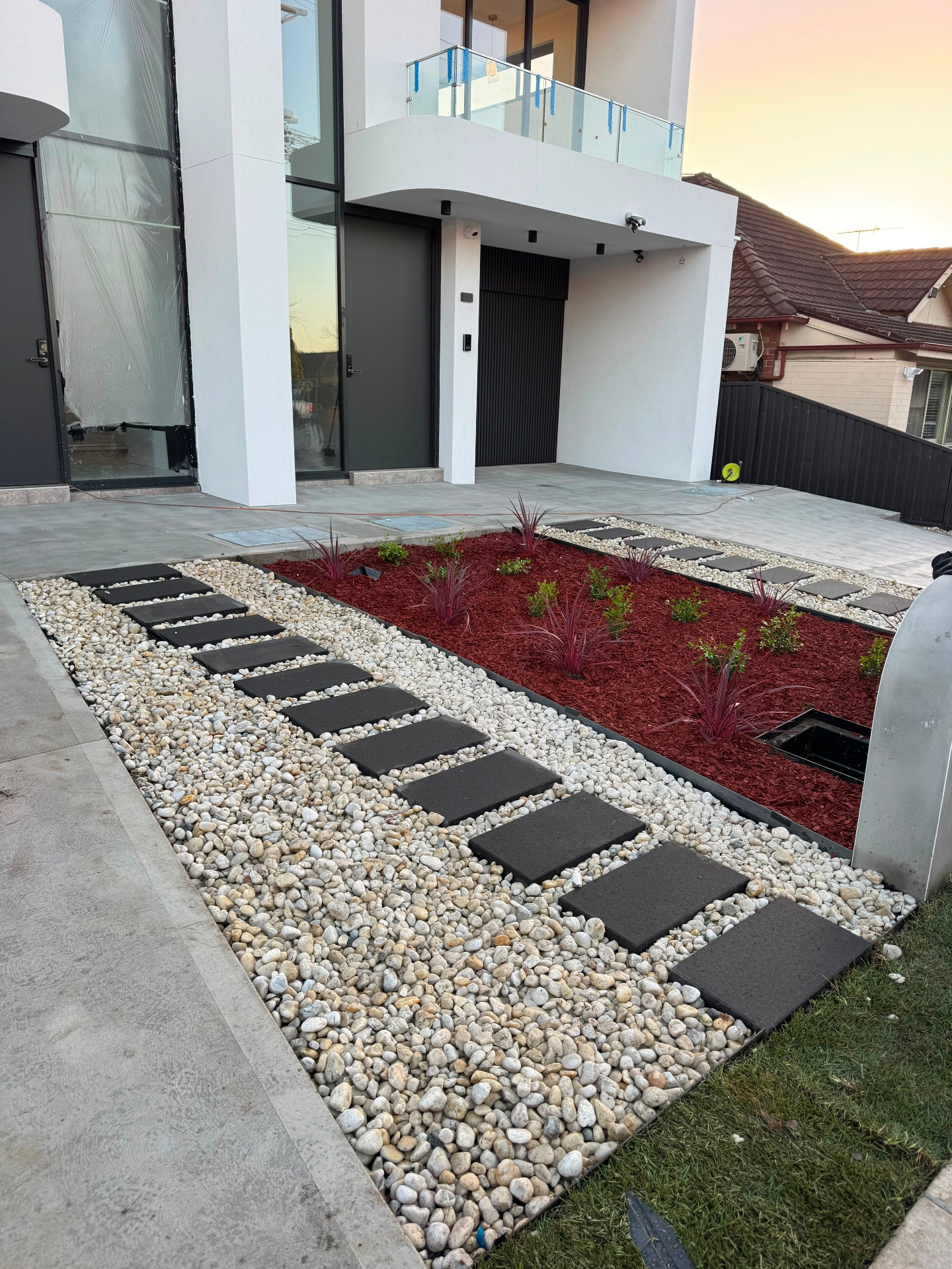 Pebble Pathway & Feature Garden Bed